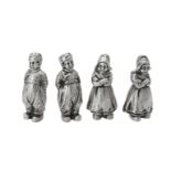Two pairs of German silver figural pepperettes by B. Neresheimer & Sohne
