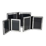 Three silver mounted folding double photo frames by Kitney & Co.