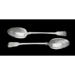 A pair of Victorian silver fiddle, thread and shell pattern serving spoons by Philip Weekes