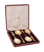 A cased set of four matched silver gilt apostle spoons