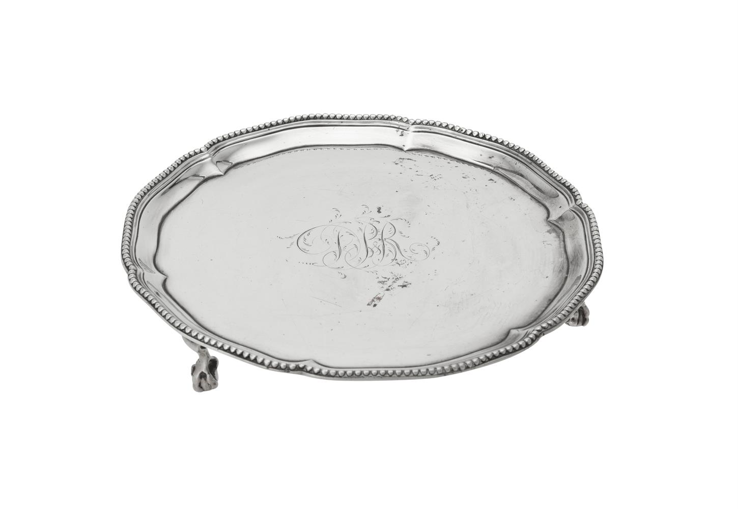 A George III silver shaped circular waiter by Thomas Pratt & Arthur Humphries