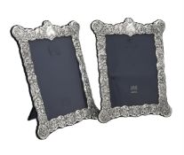 A pair of silver mounted shaped rectangular photo frames by Carr's of Sheffield Ltd.