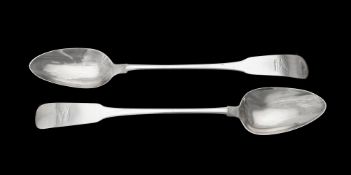 A pair of George III Irish silver fiddle pattern serving spoons by Samuel Neville