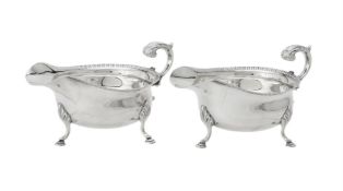 A pair of silver oval sauce boats by C. J. Vander Ltd.