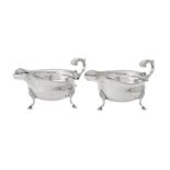 A pair of silver oval sauce boats by C. J. Vander Ltd.