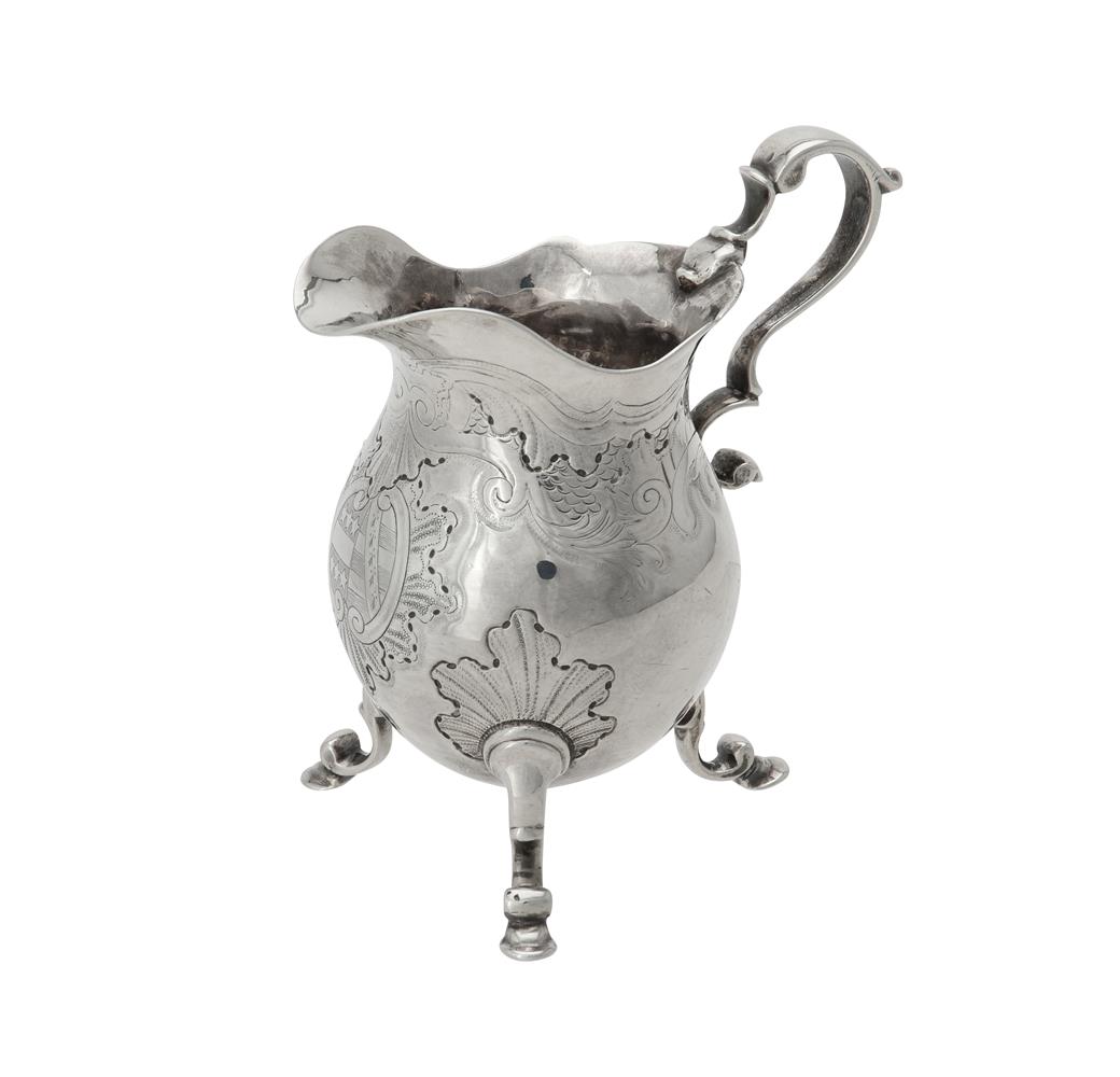 A George II silver baluster cream jug by Ayme Videau