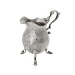 A George II silver baluster cream jug by Ayme Videau