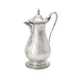 A George III silver pear shaped jug by Daniel Smith & Robert Sharp