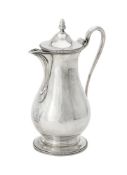 A George III silver pear shaped jug by Daniel Smith & Robert Sharp