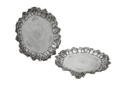 A pair of early Victorian silver shaped circular salvers by John Tapley