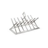 A Victorian silver six division toast rack by George Fox