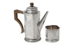 A silver Art Deco bachelors coffee pot and sugar bowl by Charles S. Green & Co. Ltd.