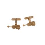 A pair of gold coloured violin cufflinks