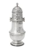 A silver baluster sugar castor by Carrington & Co.