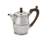 A George III silver bachelors tea pot