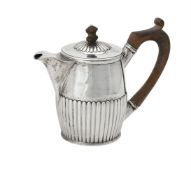 A George III silver bachelors tea pot