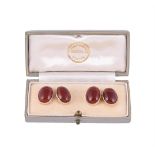 A pair of 1970s cabochon cornelian cufflinks by Cropp & Farr