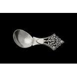 An Arts & Crafts silver tree of life pattern caddy spoon by Henry George Murphy