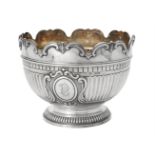 A Victorian silver shaped circular pedestal punch bowl by Sibray, Hall & Co.
