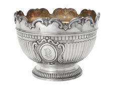 A Victorian silver shaped circular pedestal punch bowl by Sibray, Hall & Co.