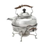 A late Victorian silver circular kettle on stand by George Nathan & Ridley Hayes