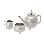 Y A Victorian silver globular three piece tea set by Charles Boyton (II)