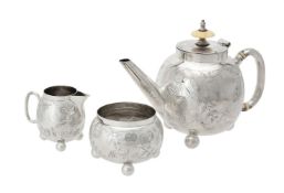Y A Victorian silver globular three piece tea set by Charles Boyton (II)