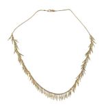 A gold Feather necklace by H. Stern