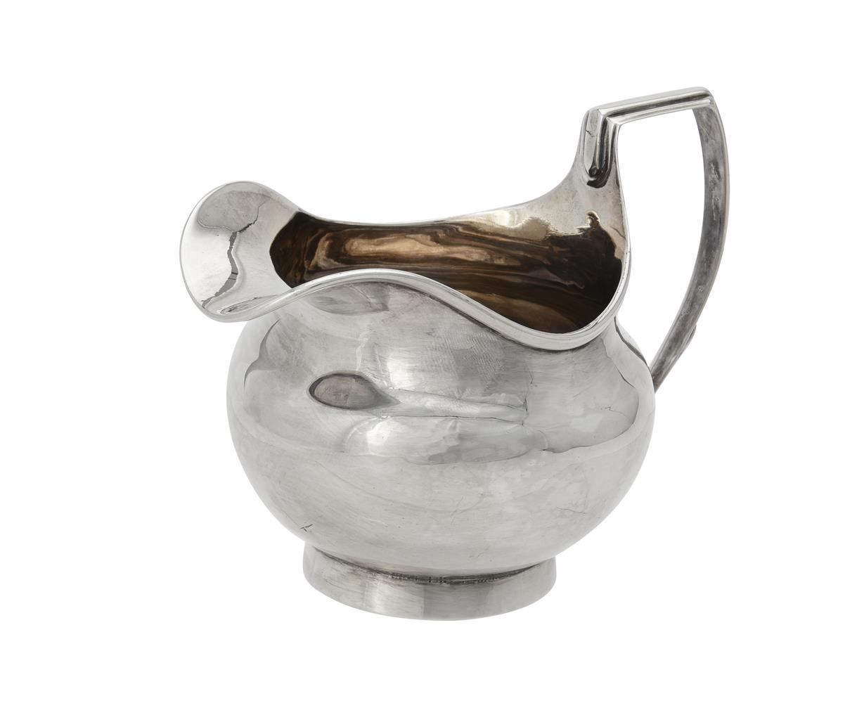 A George III silver squat bulbous cream jug by Alice & George Burrows II