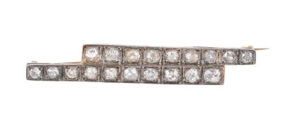 A diamond bar brooch