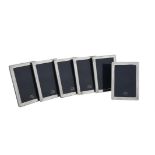 Six silver mounted rectangular photo frames by Kitney & Co.