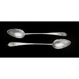 A pair of George III silver pointed Old English pattern serving spoons by William & Patrick Cunningh