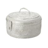 An Omani silver coloured circular box