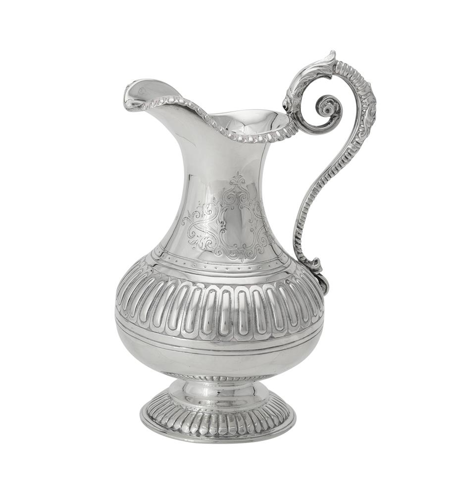 A Victorian silver baluster jug by Joseph Angell II