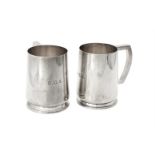 A pair of silver pint mugs by William Suckling Ltd.