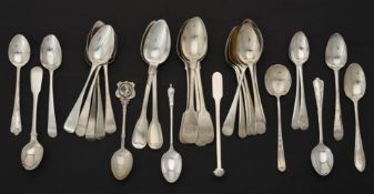 A collection of assorted silver tea spoons
