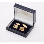 A pair of citrine and gold coloured cufflinks