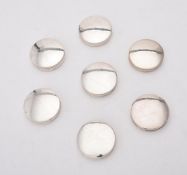 Seven silver circular boxes