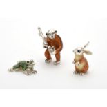 Silver and enamel models of a monkey, frog and a rabbit