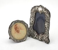A late Victorian silver mounted photo frame by William Comyns & Sons