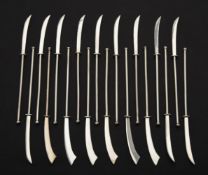 Eighteen silver models of glaives