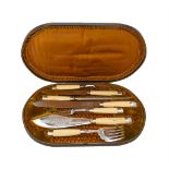 Y A cased late Victorian seven piece carving set