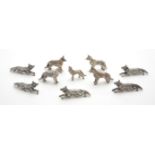 Ten assorted silver models of foxes