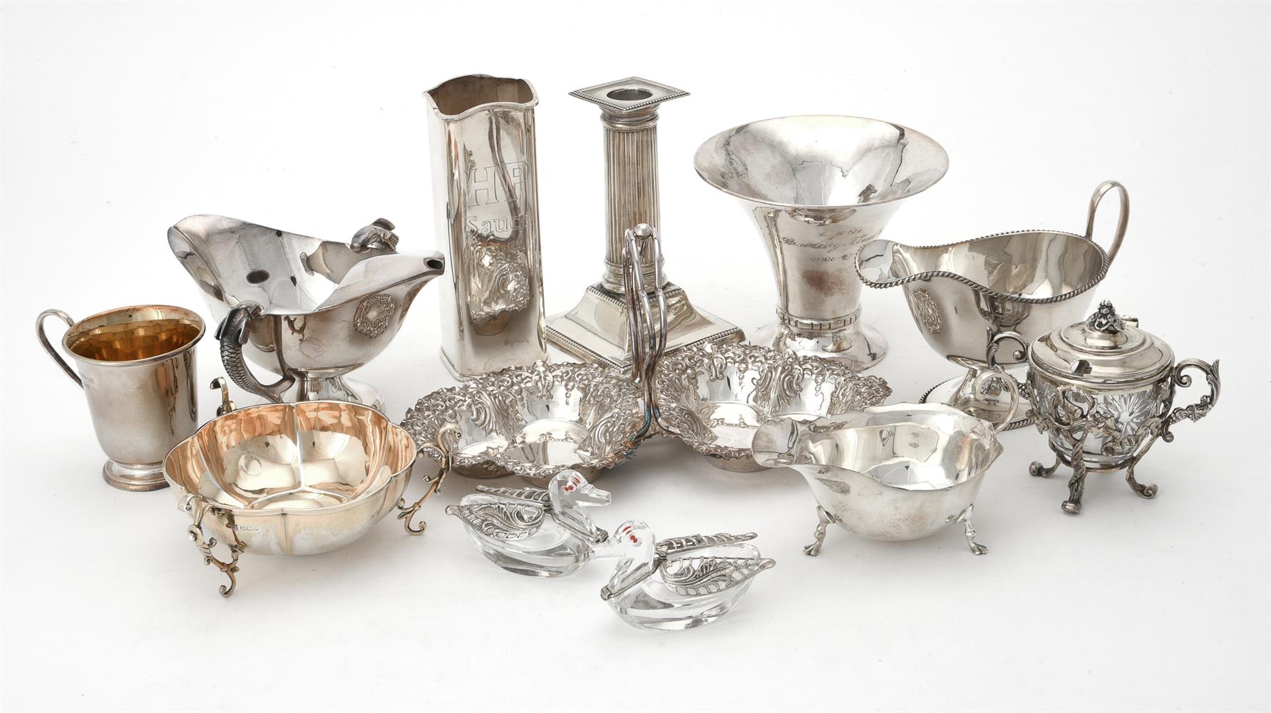 A collection of silver and silver coloured items