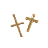 Two gold coloured cross pendants