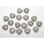 Seventeen silver heart shaped pendant boxes