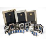 A collection of silver mounted photo frames