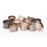 A collection of eleven silver napkin rings