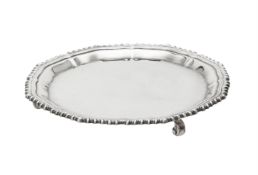 A silver shaped circular waiter by Garrard & Co. Ltd.