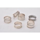A collection of silver napkin rings